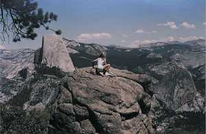 [photo: girl on rocks]